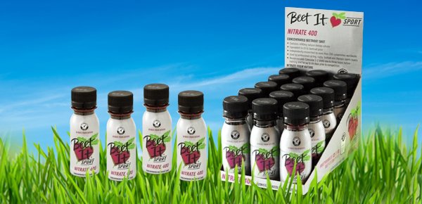 Beet It bottles and pack on grass